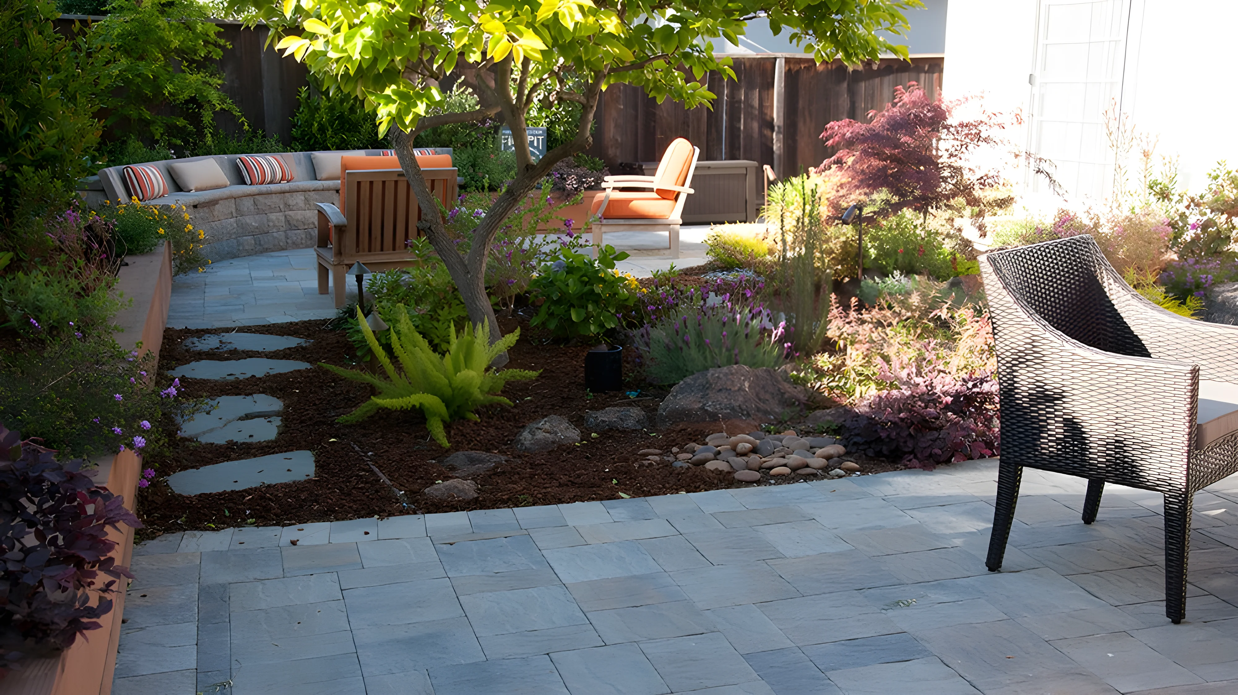 Backyard transformation with paver patio and retaining wall by Black Diamond